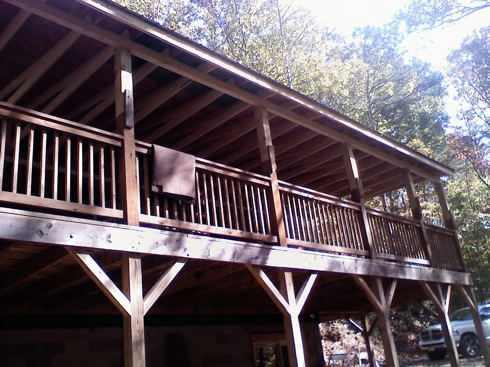 Timber framing under a new elevated porch and deck — Roof Leak Repair in Hastings On Hudson by Roofing Brothers